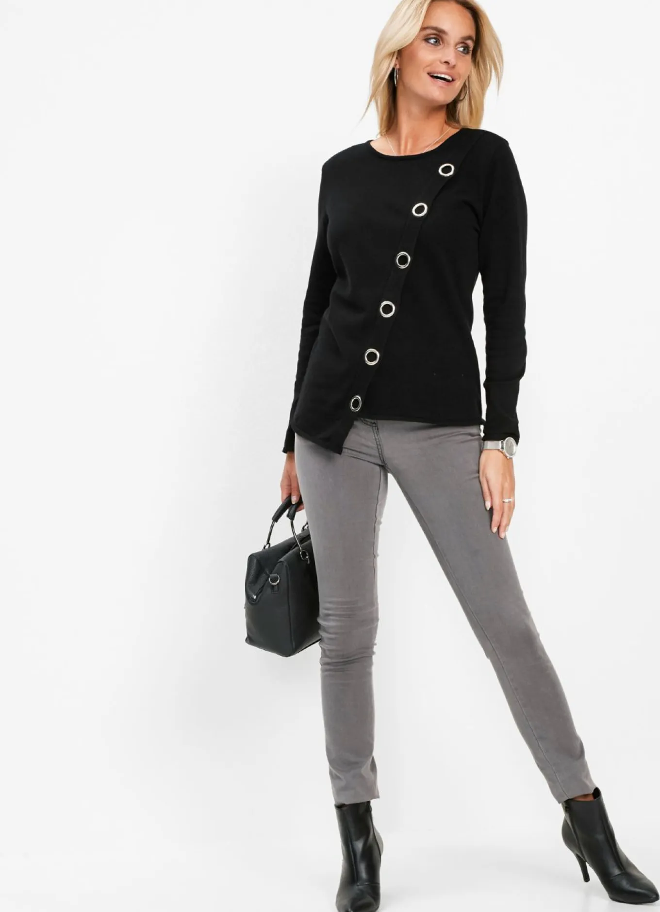 Jersey de punto fino con detalles de tachuelas