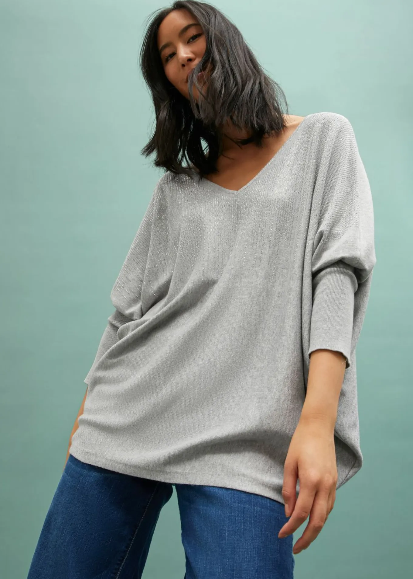Jersey de punto fino con aplicación de piedras brillantes