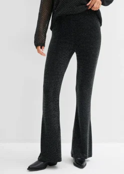 Leggings acampanados con purpurina