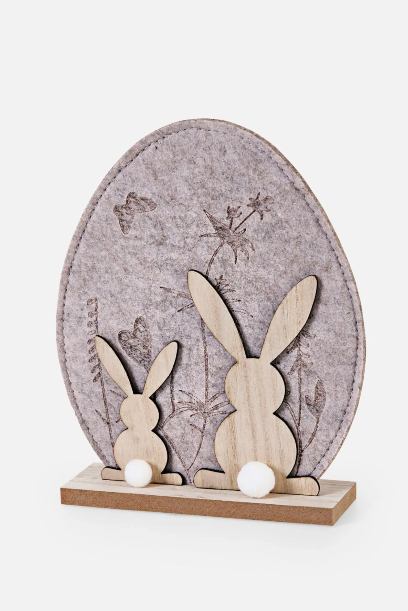 Objeto decorativo en forma de huevo con conejito