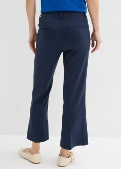 Pantalón 7/8 acampanado con botón decorativo