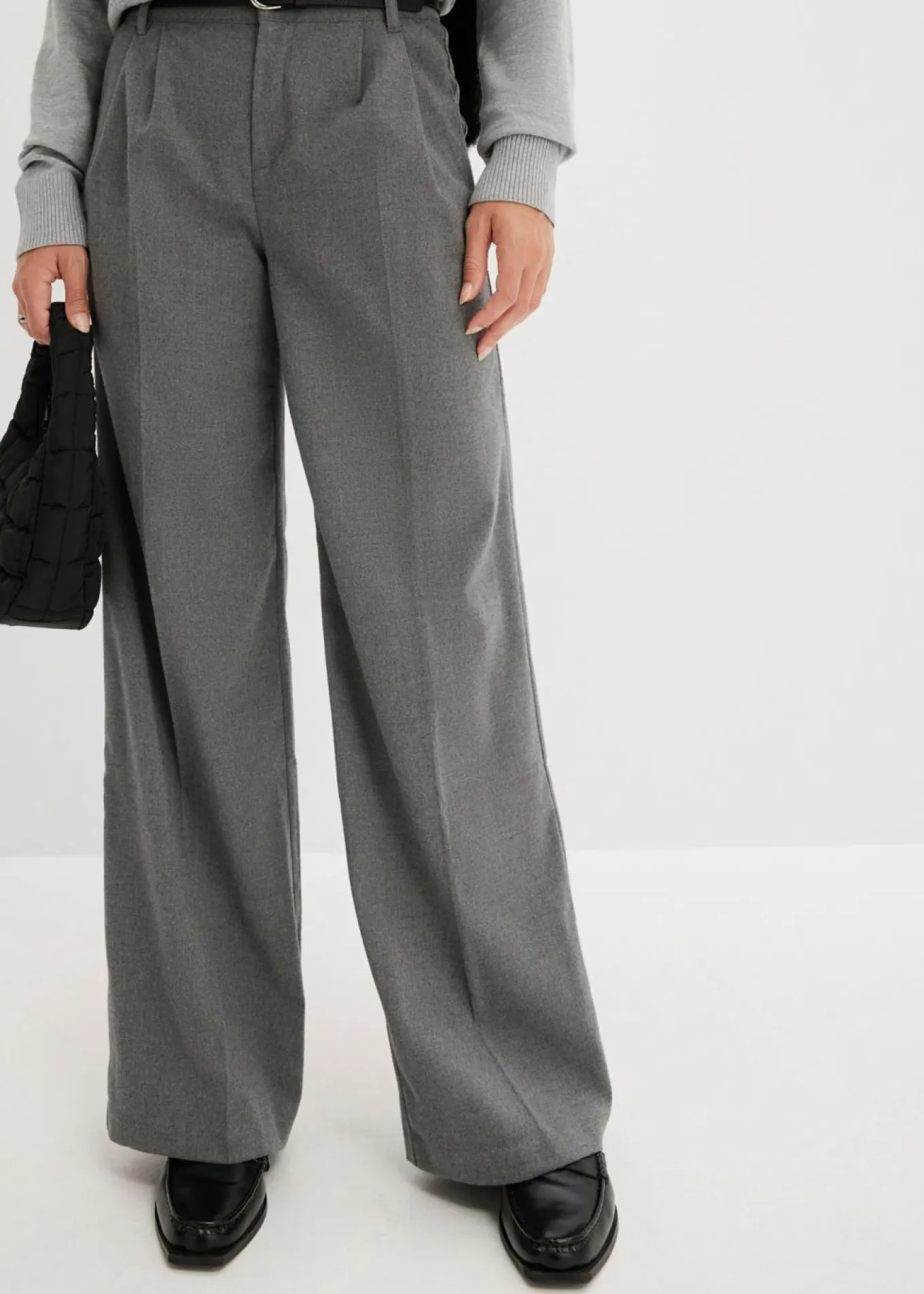 Pantalón ancho de pliegues