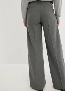 Pantalón ancho de pliegues