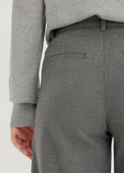 Pantalón ancho de pliegues