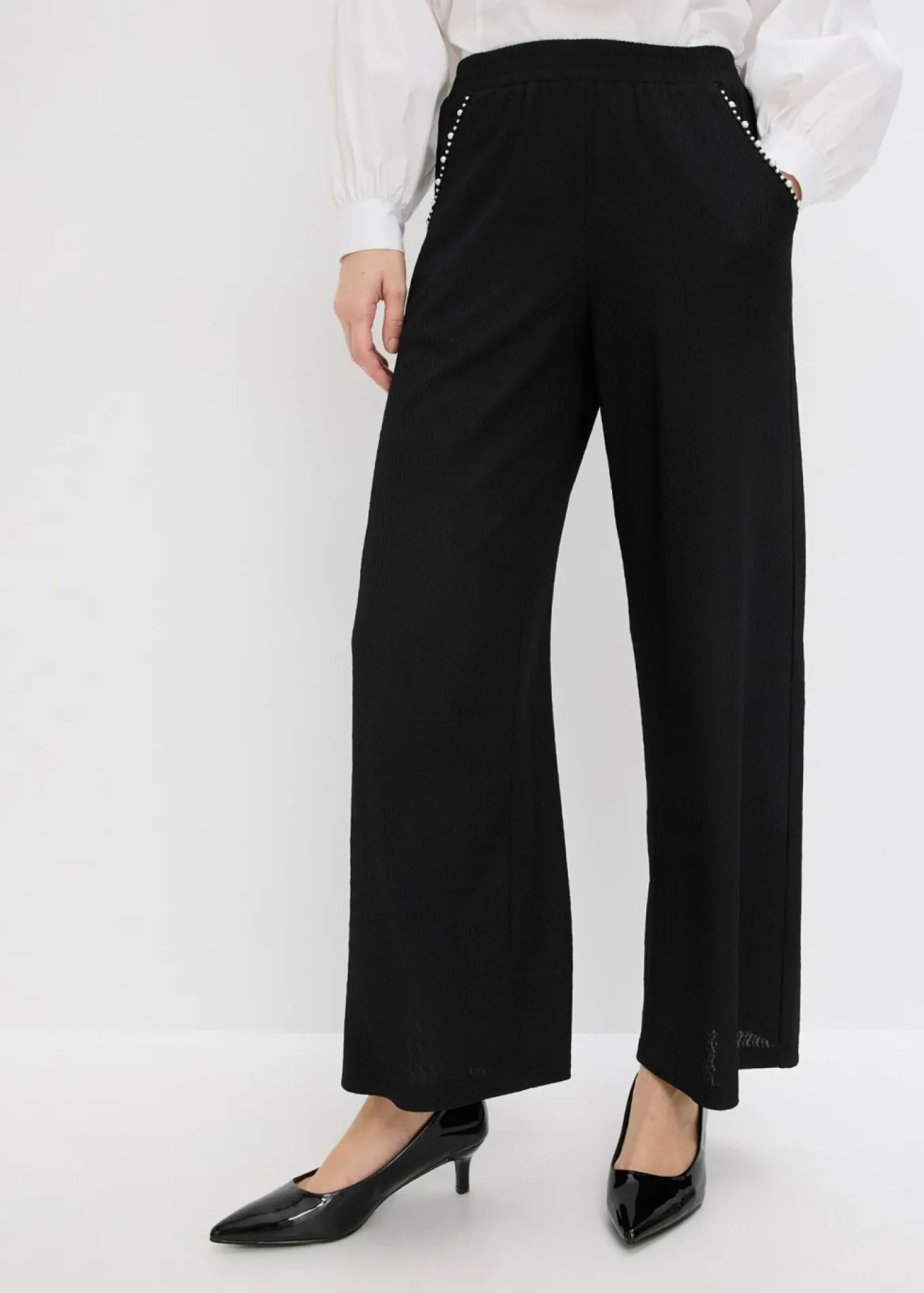 Pantalón con aplicaciones de perlas de punto estructurado