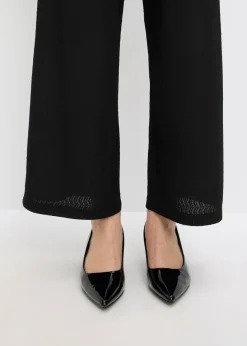 Pantalón con aplicaciones de perlas de punto estructurado