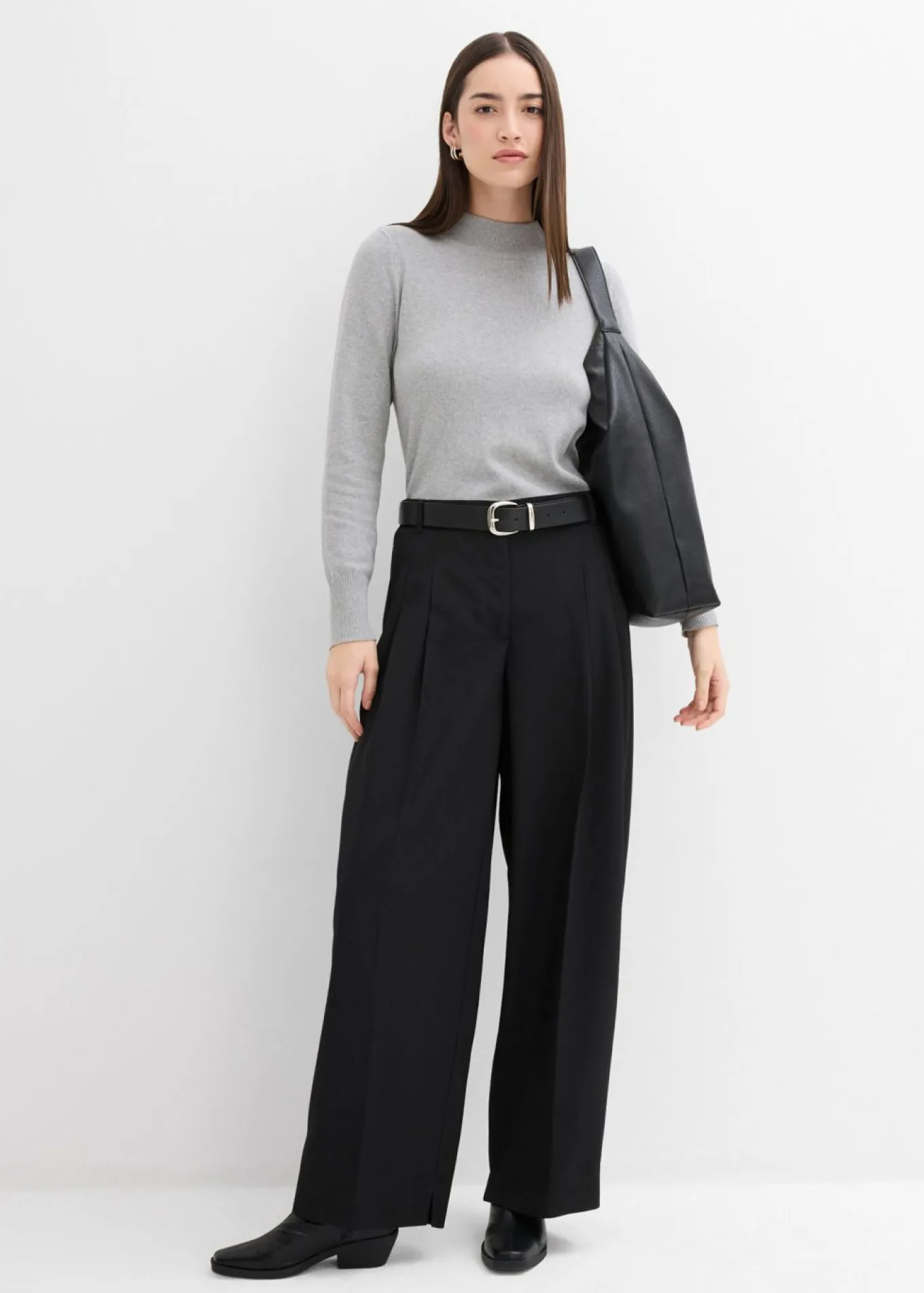 Pantalón con pinzas, cinturilla cómoda y abertura