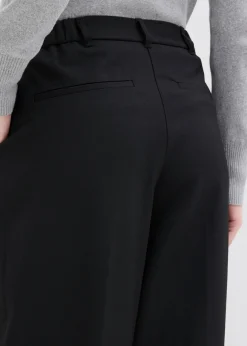 Pantalón con pinzas, cinturilla cómoda y abertura