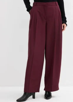 Pantalón con pinzas, cinturilla cómoda y abertura
