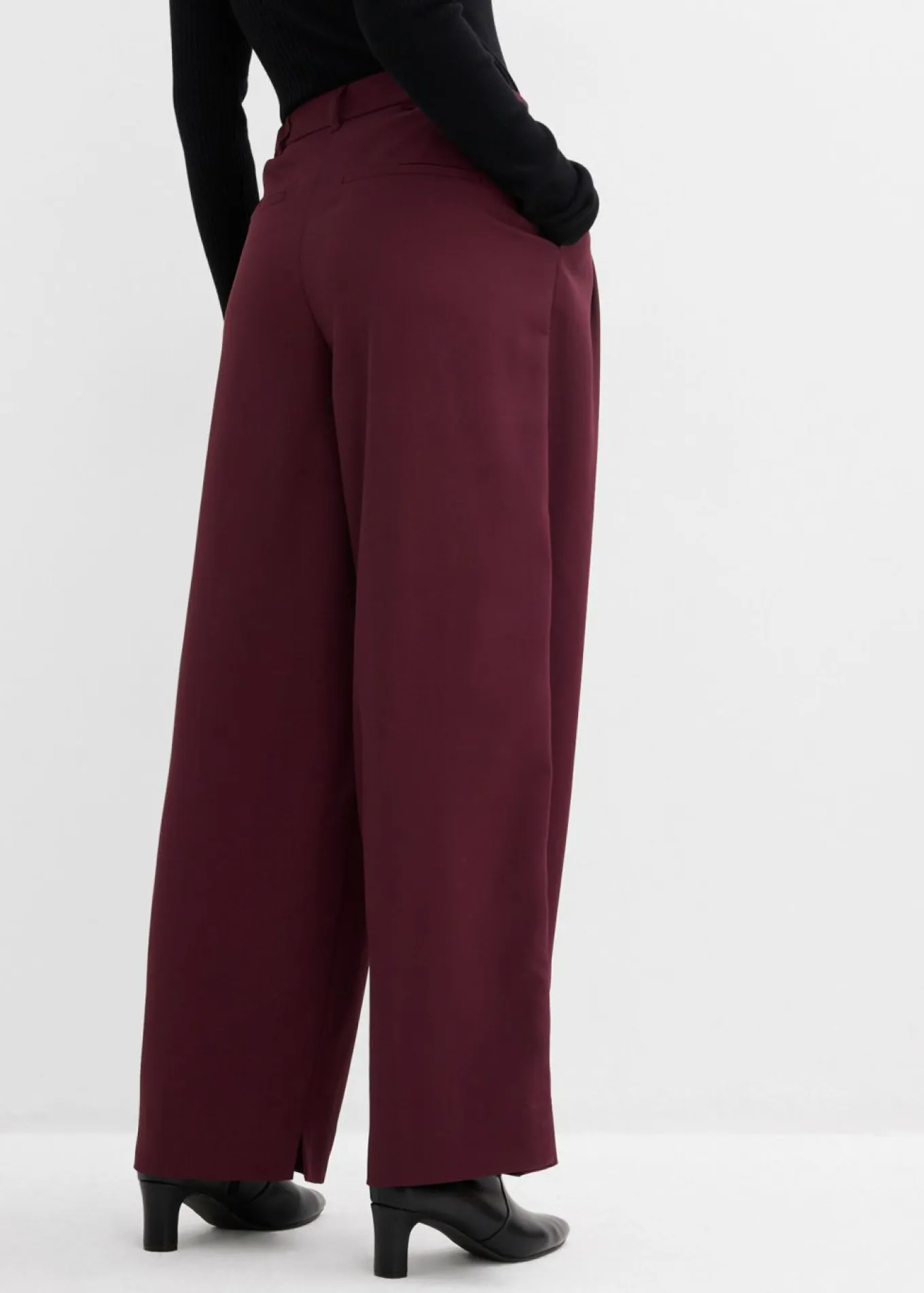 Pantalón con pinzas, cinturilla cómoda y abertura