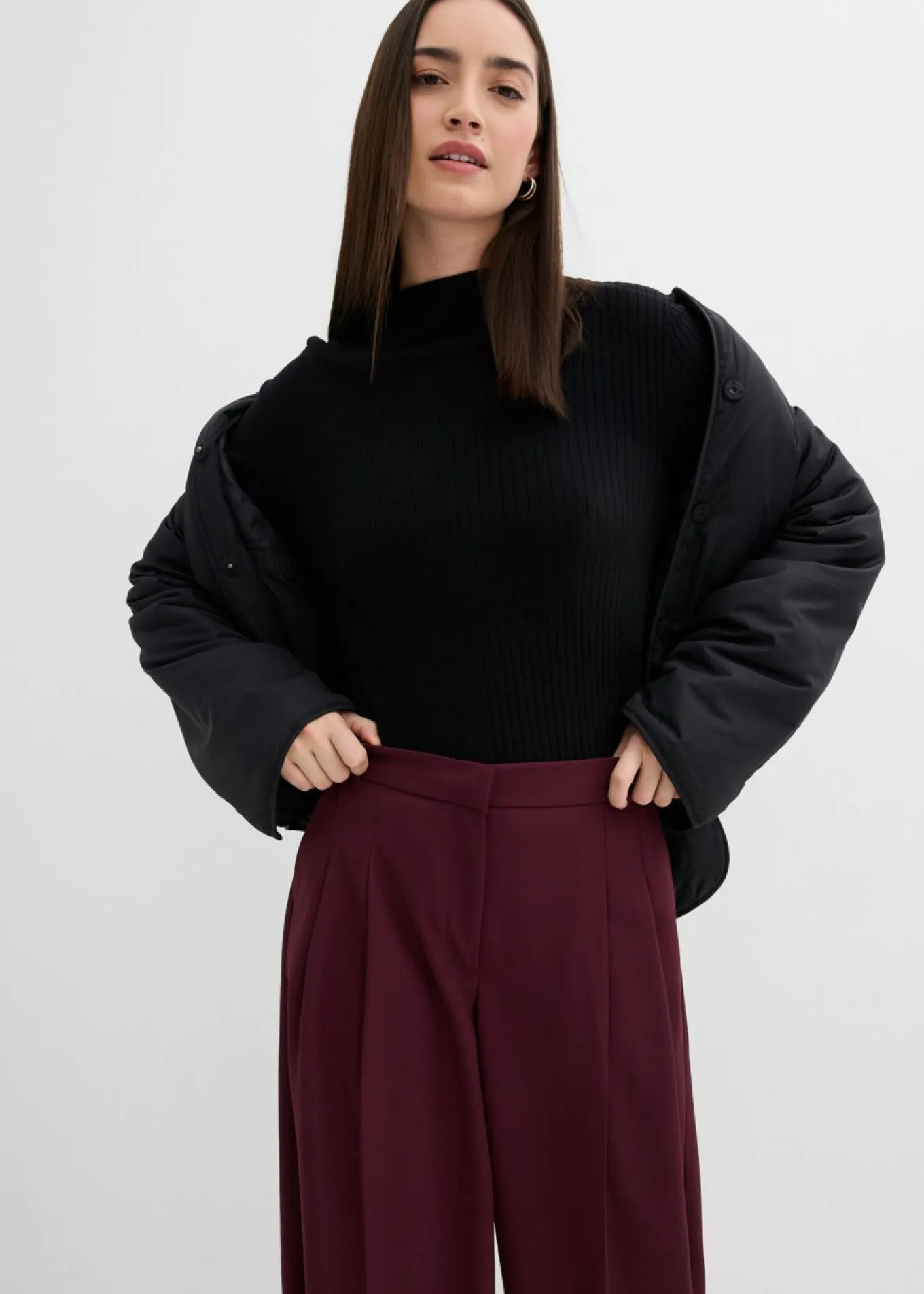 Pantalón con pinzas, cinturilla cómoda y abertura