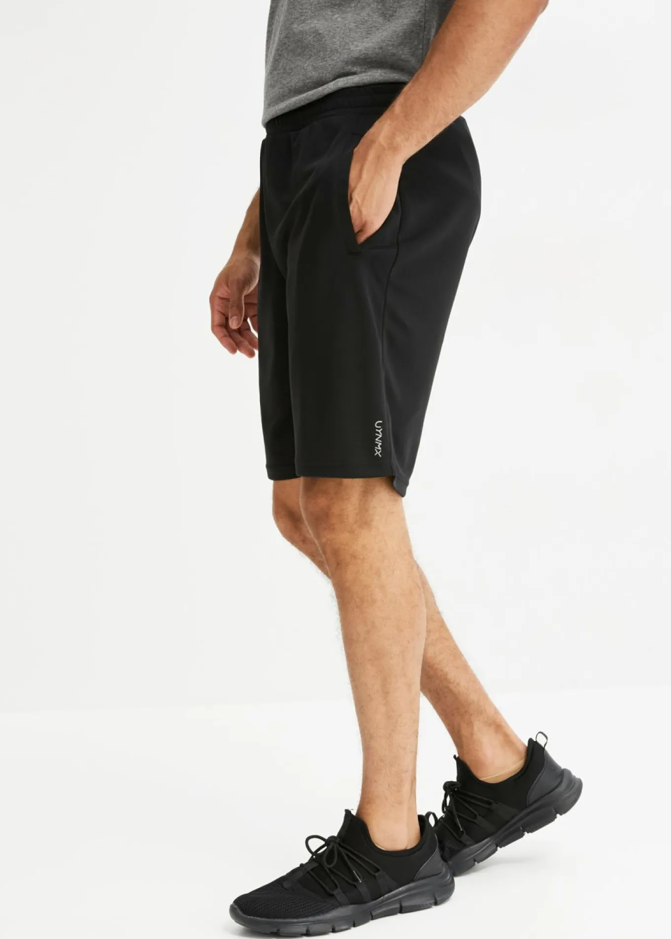 Pantalón corto deportivo de material de secado rápido