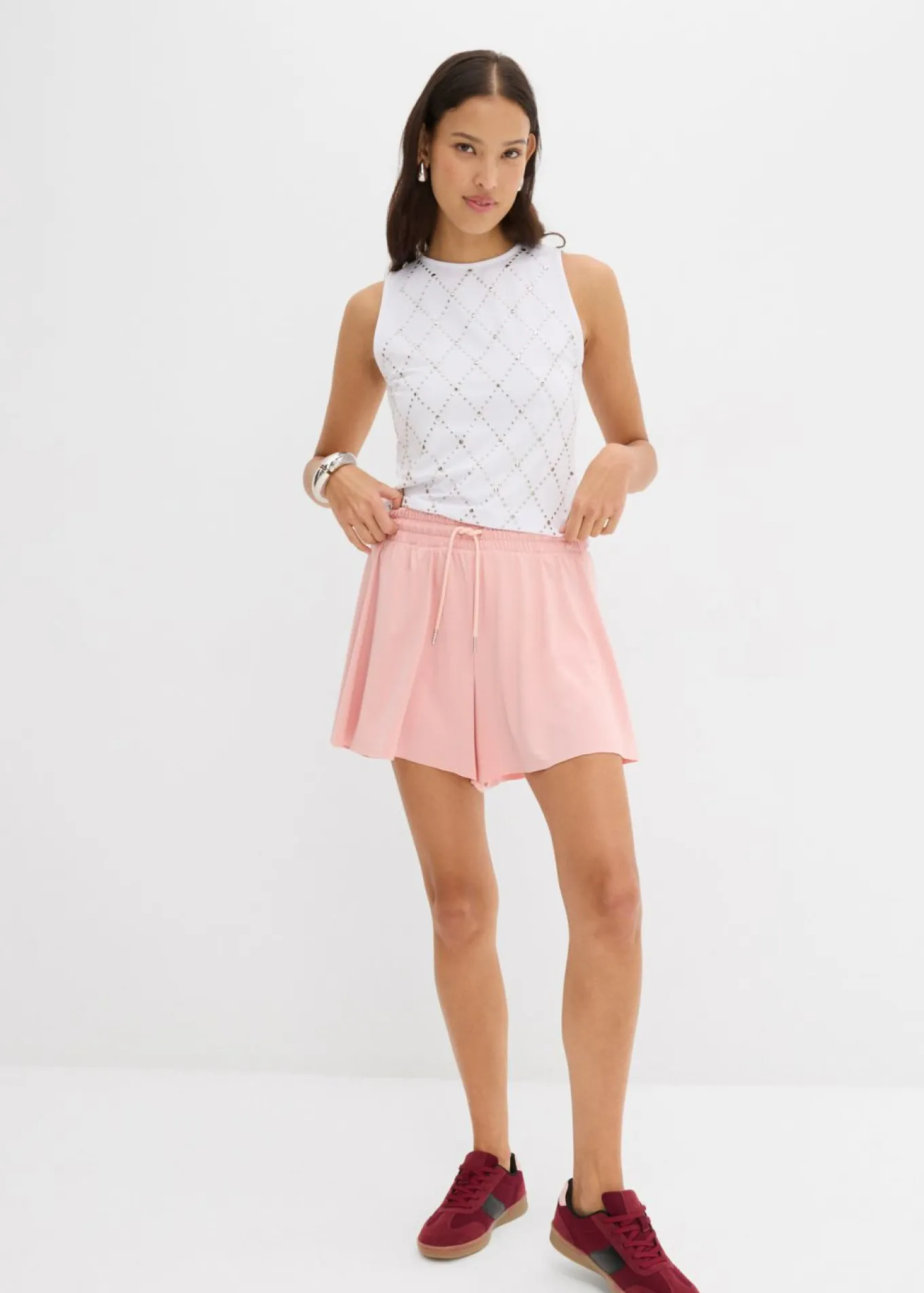 Pantalón corto sin cierre con diseño de tenis