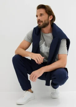 Pantalón de chándal con bolsillos tipo cargo y corte holgado