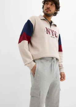 Pantalón de chándal con bolsillos tipo cargo y corte holgado