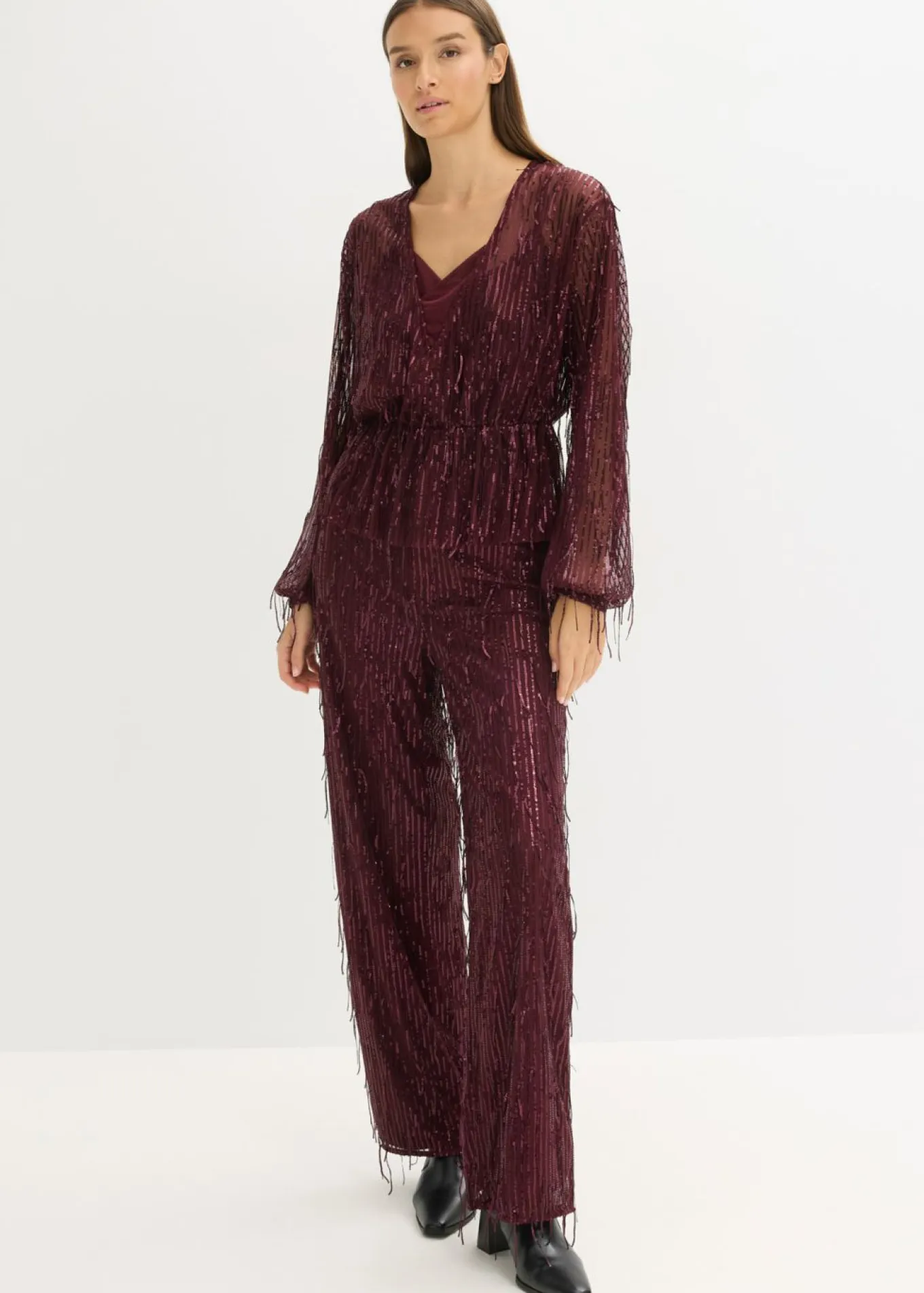 Pantalón de lentejuelas con flecos