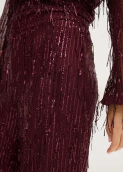 Pantalón de lentejuelas con flecos