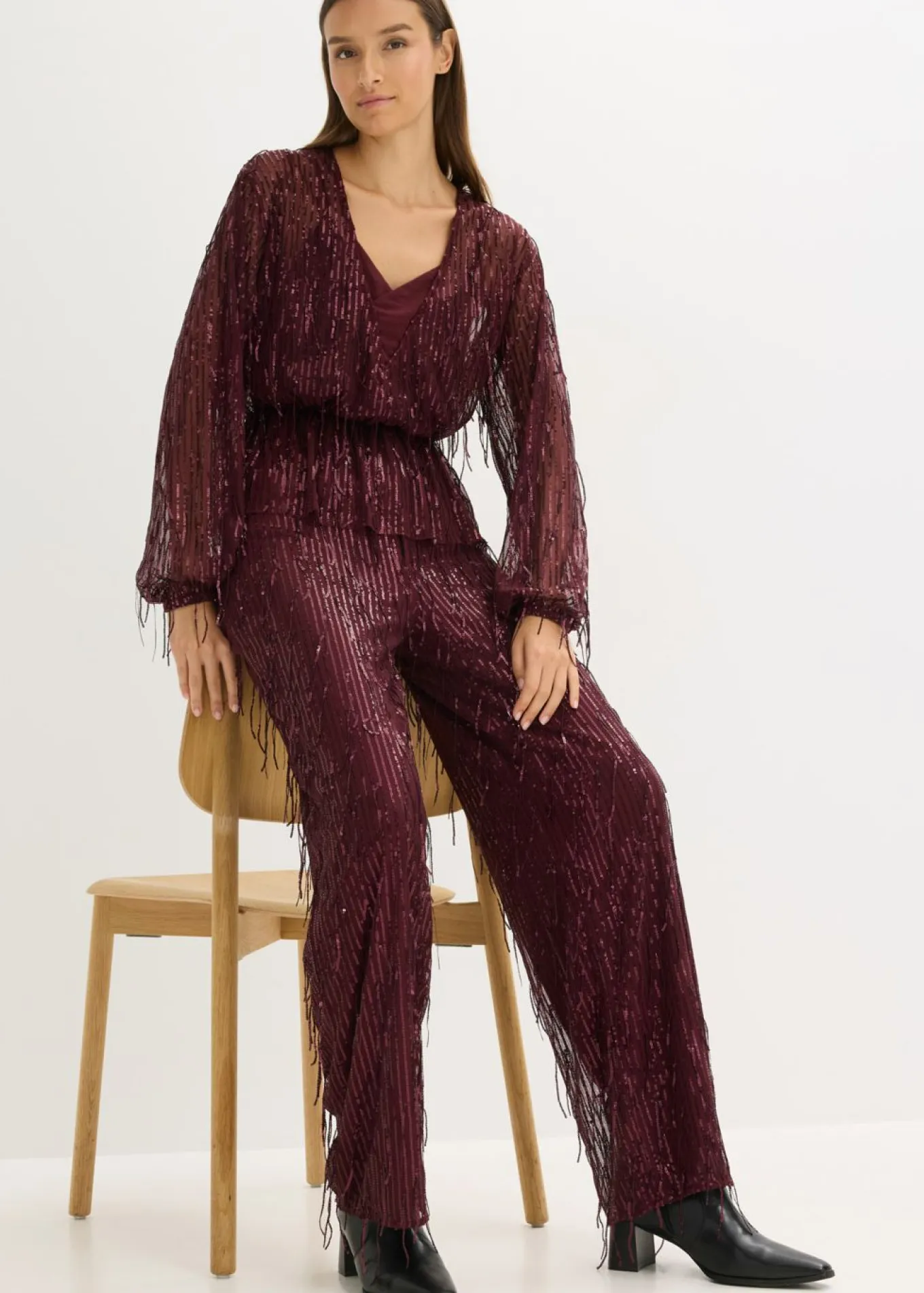 Pantalón de lentejuelas con flecos