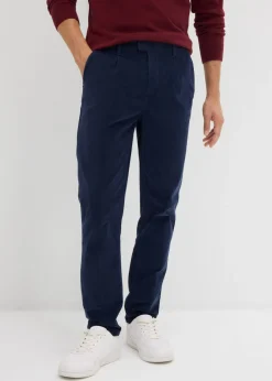 Pantalón de pana regular fit confeccionado en algodón orgánico reciclable elástico, tapered