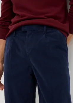 Pantalón de pana regular fit confeccionado en algodón orgánico reciclable elástico, tapered