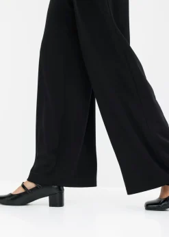 Pantalón de punto con cierre decorativo