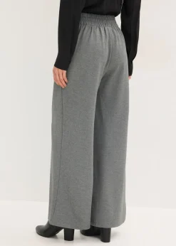 Pantalón de punto con cierre decorativo
