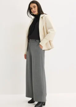 Pantalón de punto con cierre decorativo