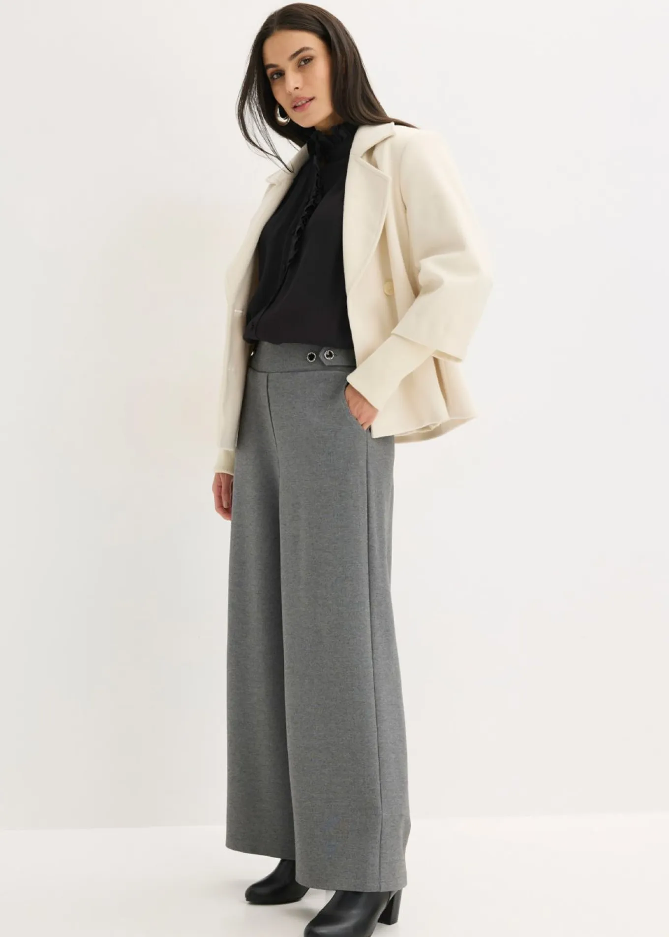 Pantalón de punto con cierre decorativo