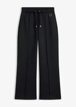 Pantalón deportivo con costuras decorativas