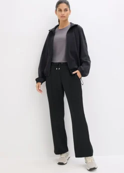 Pantalón deportivo con costuras decorativas