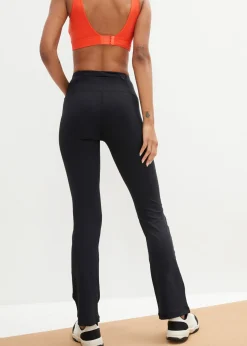 Pantalón deportivo moldeador con bolsillo y corte acampanado