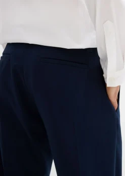 Pantalón elegante con pinzas y corte regular