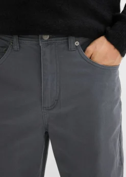 Pantalón elástico con corte clásico, cinturilla elástica y forma recta