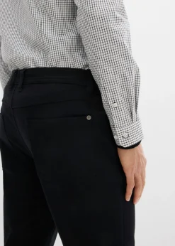 Pantalón elástico con corte clásico, cinturilla elástica y forma recta