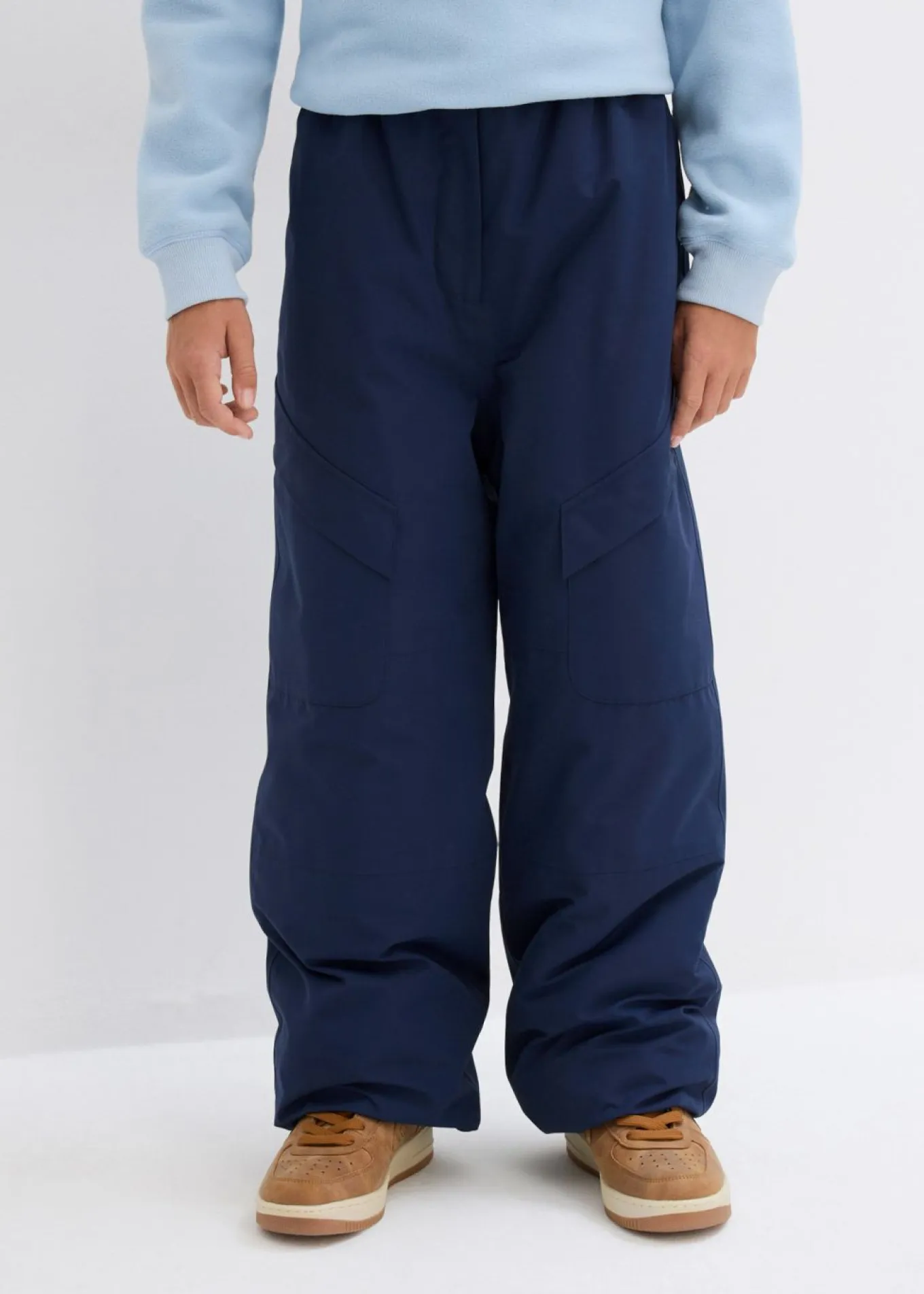 Pantalón funcional impermeable tipo cargo con forro cálido