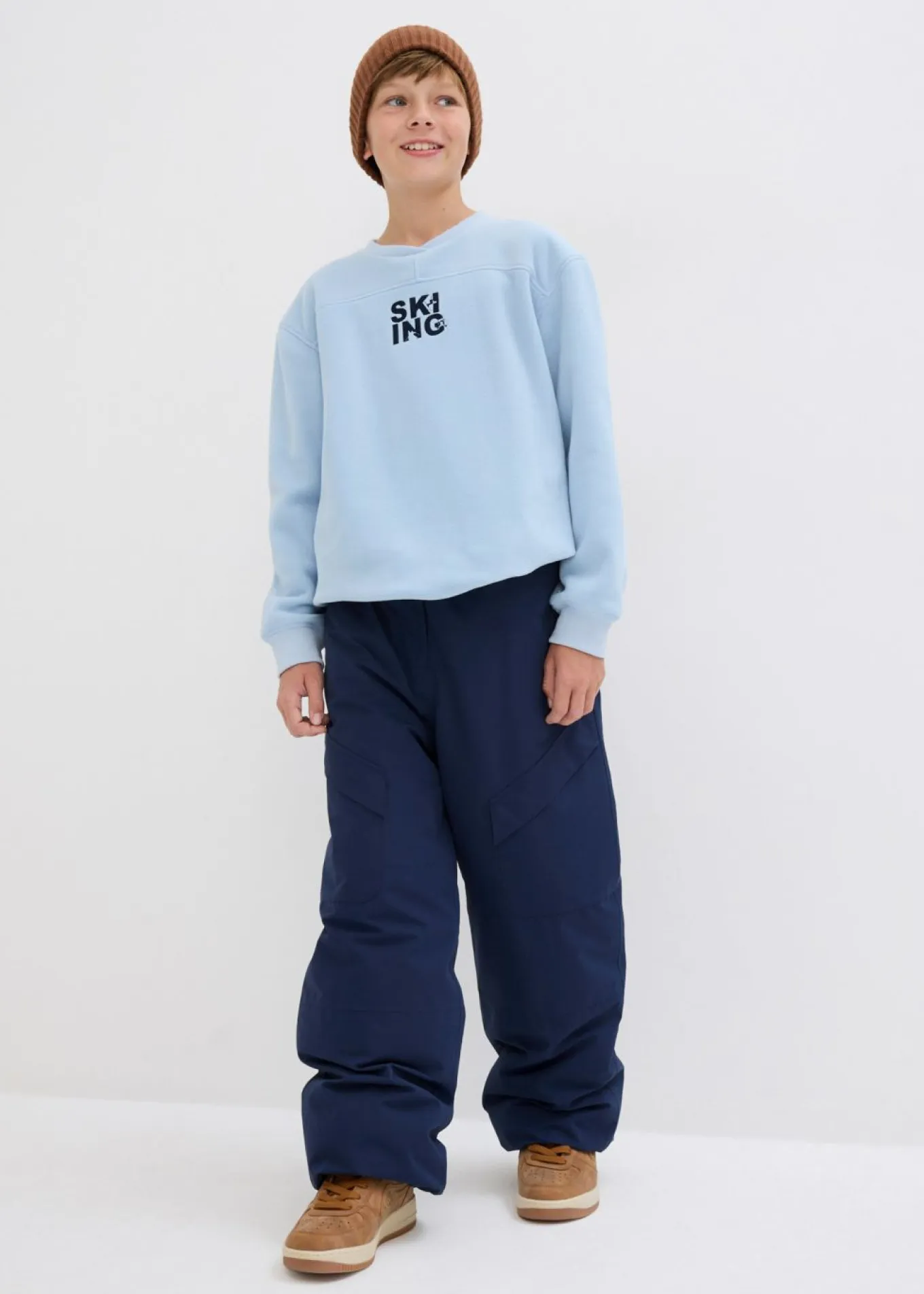 Pantalón funcional impermeable tipo cargo con forro cálido