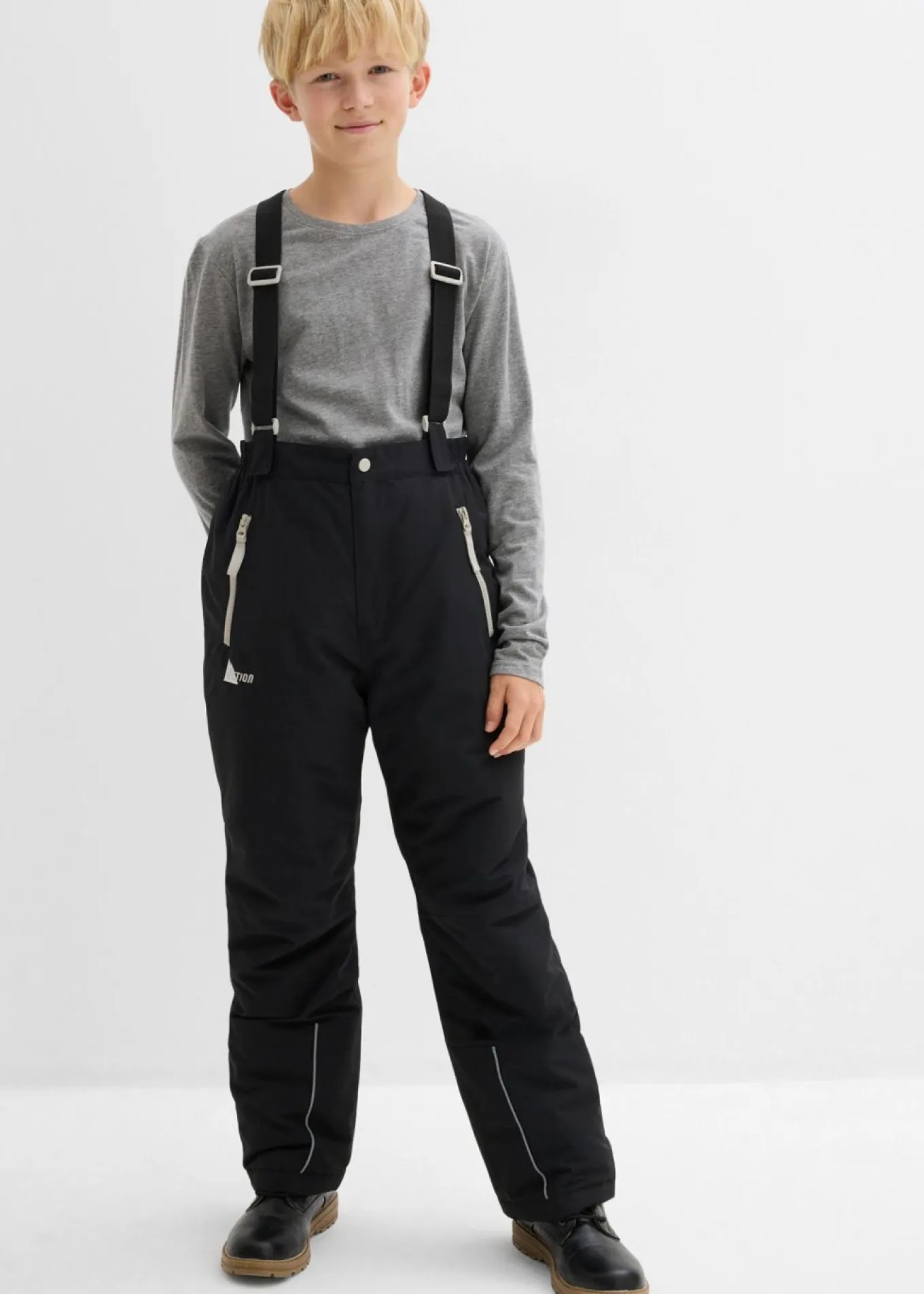 Pantalón funcional impermeable con tirantes y detalles reflectantes