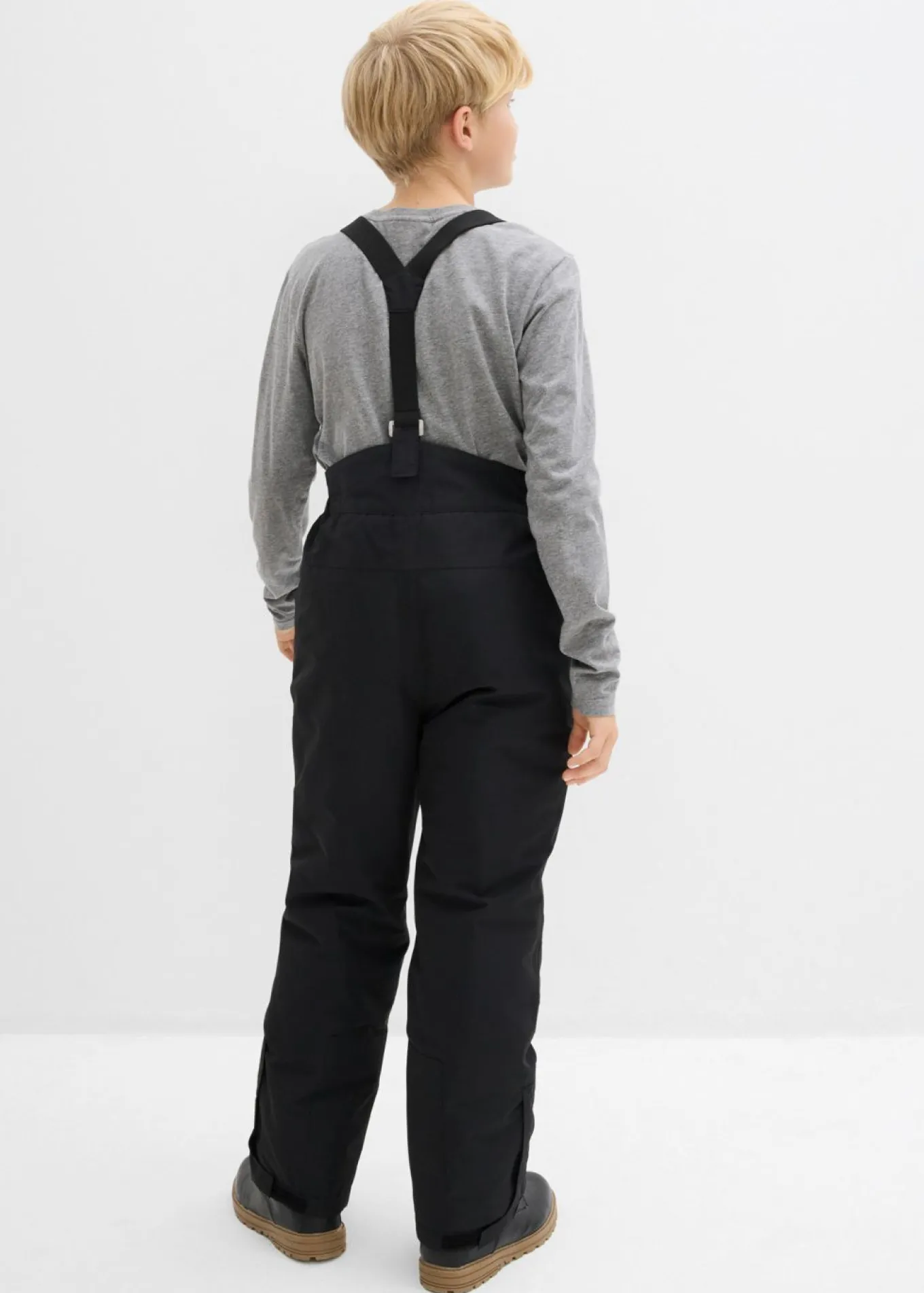 Pantalón funcional impermeable con tirantes y detalles reflectantes
