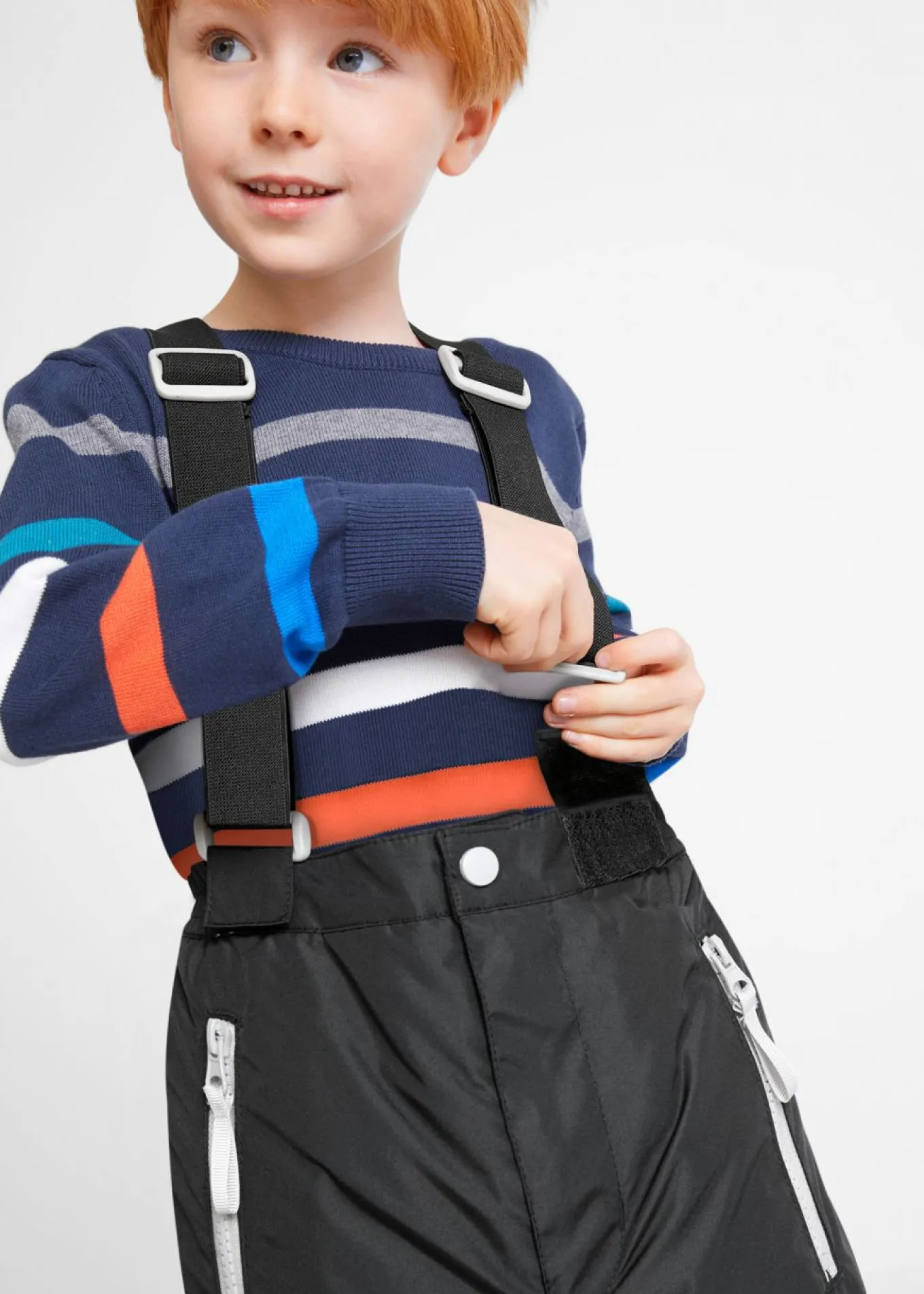 Pantalón funcional impermeable con tirantes y detalles reflectantes