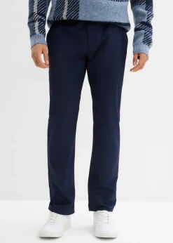Pantalón tipo chino con corte regular, cinturilla elástica, cinturón y forma recta