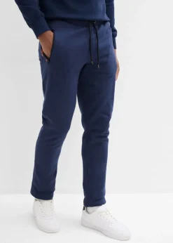 Pantalones de chándal con prácticos bolsillos con cremallera, confeccionados en algodón orgánico