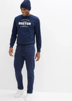 Pantalones de chándal con prácticos bolsillos con cremallera, confeccionados en algodón orgánico