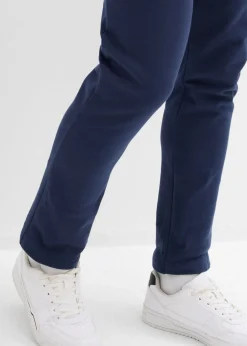 Pantalones de chándal con prácticos bolsillos con cremallera, confeccionados en algodón orgánico