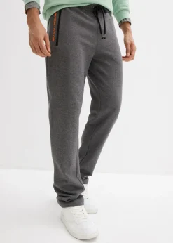 Pantalones de chándal con prácticos bolsillos con cremallera, confeccionados en algodón orgánico