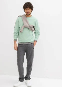 Pantalones de chándal con prácticos bolsillos con cremallera, confeccionados en algodón orgánico