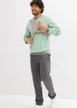Pantalones de chándal con prácticos bolsillos con cremallera, confeccionados en algodón orgánico