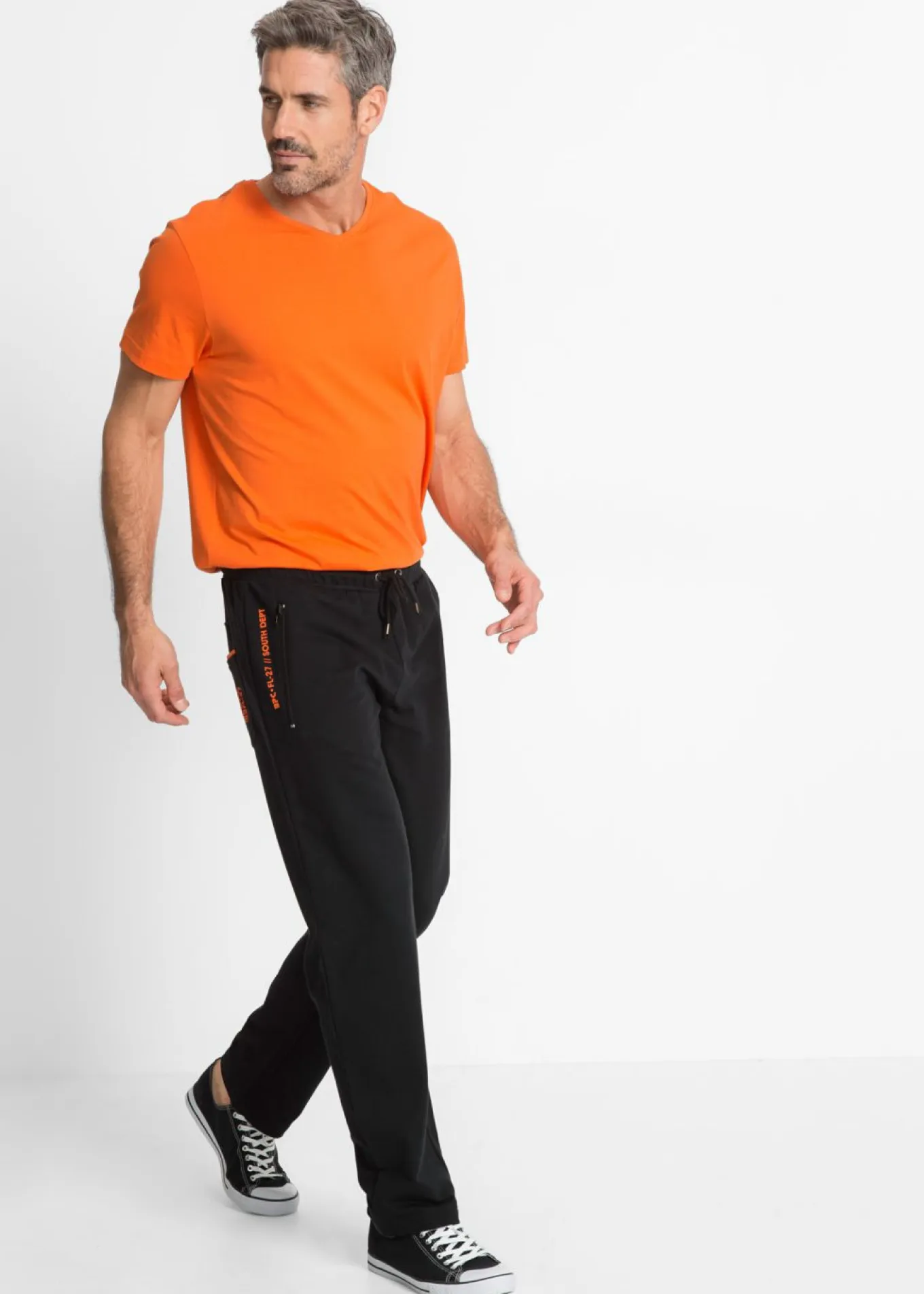 Pantalones de chándal con prácticos bolsillos con cremallera, confeccionados en algodón orgánico