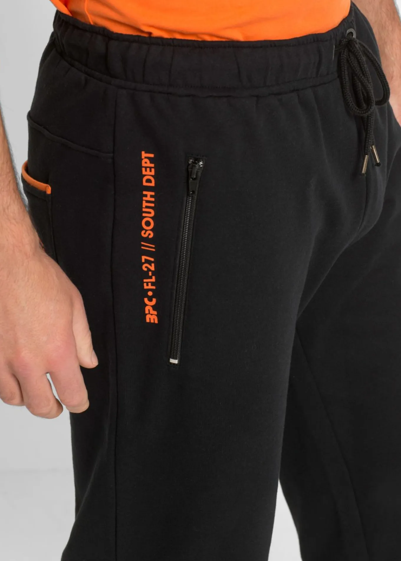 Pantalones de chándal con prácticos bolsillos con cremallera, confeccionados en algodón orgánico