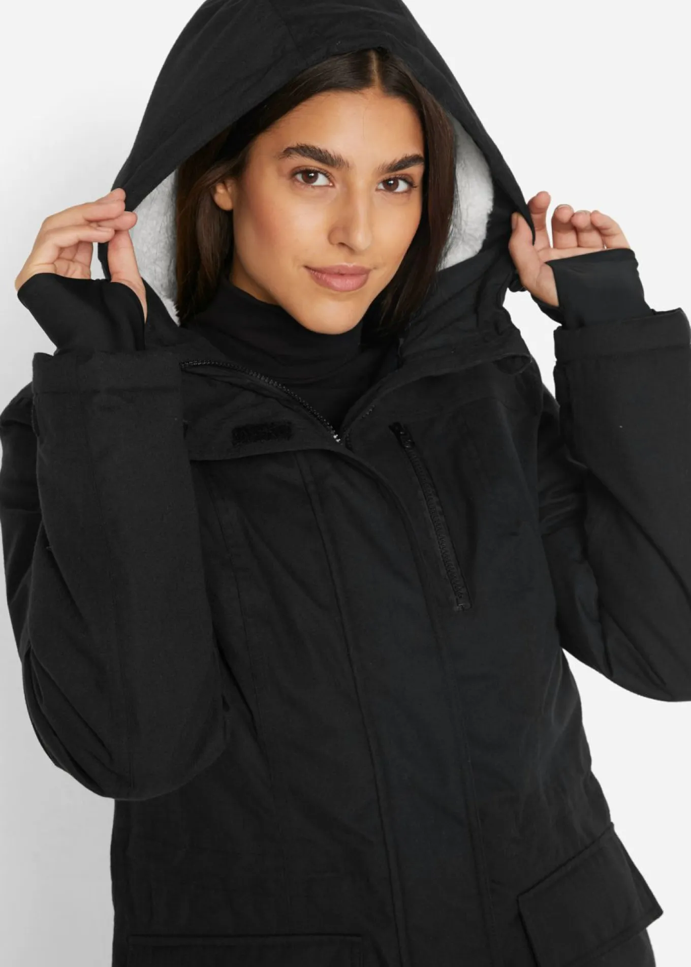 Parka funcional impermeable con forro de peluche en la capucha