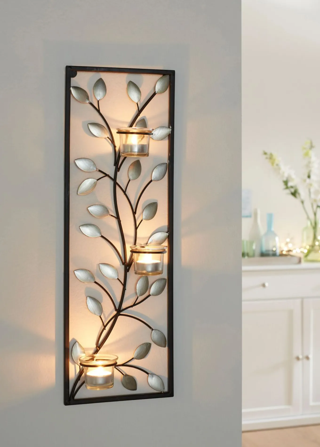 Portavelas de pared